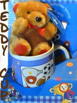 teddy bear in a mug for delivery in Cyprus with flowers and plants